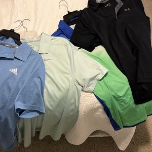 4 like new golf shirts, none fit me properly (ALL SIZE LARGE BUT ONE)
